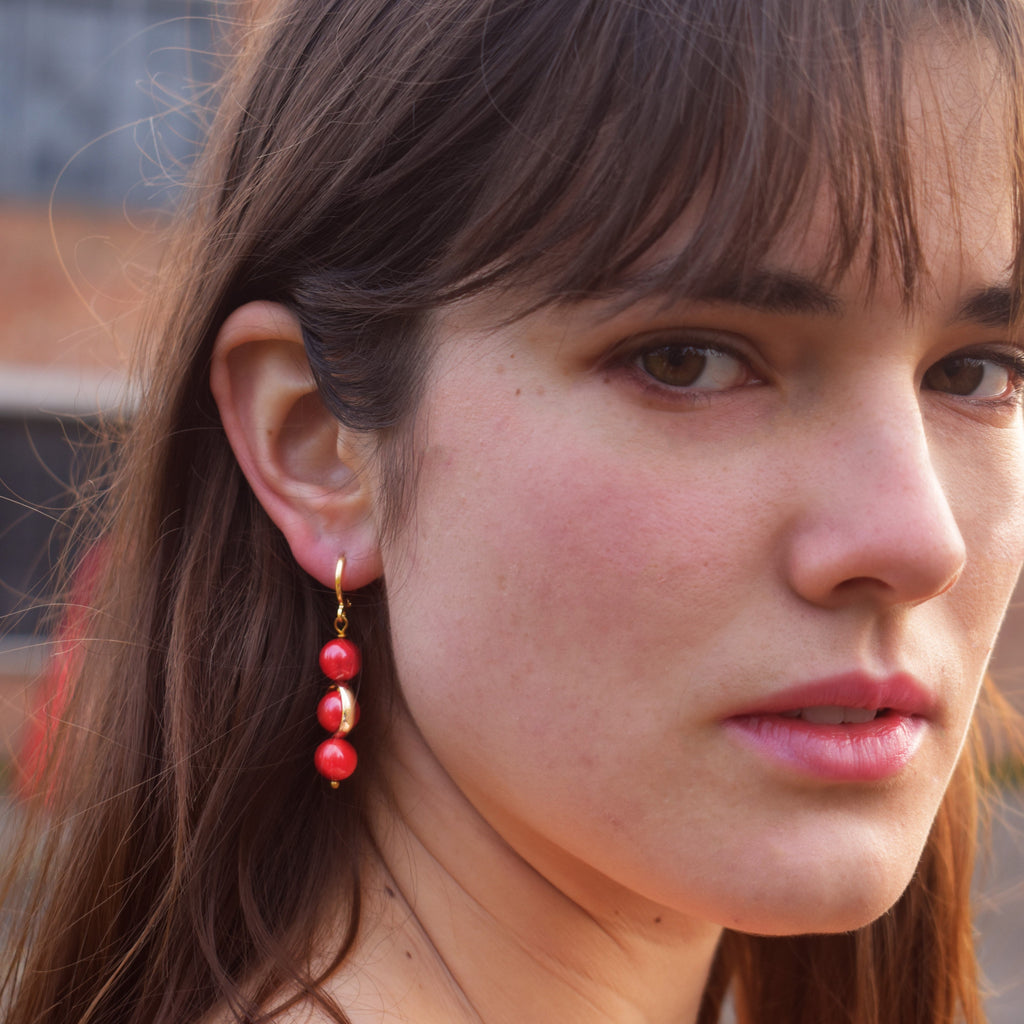 Coral gemstone asymmetric gold huggie earrings | by Ifemi Jewels-0